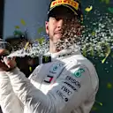 Lewis Hamilton (GBR) Mercedes-AMG F1 celebrates on the podium with the champagne at Formula One World Championship, Rd1, Australian Grand Prix, Race, Melbourne, Australia, Sunday 25 March 2018. © Mark Sutton/Sutton Images