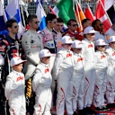 Drivers and grid kids observe the National Anthem on the grid at Formula One World Championship, Rd1, Australian Grand Prix, Race, Melbourne, Australia, Sunday 25 March 2018. © Jerry Andre/Sutton Images
