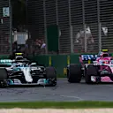 Valtteri Bottas (FIN) Mercedes-AMG F1 W09 EQ Power+ and Esteban Ocon (FRA) Force India VJM11 battle at Formula One World Championship, Rd1, Australian Grand Prix, Race, Melbourne, Australia, Sunday 25 March 2018. © Daniel Kalisz/Sutton Images