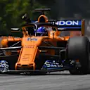 Fernando Alonso (ESP) McLaren MCL33 removes a tear off from his visor at Formula One World Championship, Rd9, Austrian Grand Prix, Qualifying, Spielberg, Austria, Saturday 30 June 2018. © Mark Sutton/Sutton Images