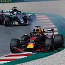 Daniel Ricciardo (AUS) Red Bull Racing RB14 with smoking engine leads Lewis Hamilton (GBR) Mercedes-AMG F1 W09 EQ Power+ at Formula One World Championship, Rd9, Austrian Grand Prix, Race, Spielberg, Austria, Sunday 1 July 2018. © Manuel Goria/Sutton Images