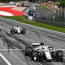 Charles Leclerc (MON) Alfa Romeo Sauber C37 and Marcus Ericsson (SWE) Alfa Romeo Sauber C37 take the chequered flag at Formula One World Championship, Rd9, Austrian Grand Prix, Race, Spielberg, Austria, Sunday 1 July 2018. © Mark Sutton/Sutton Images
