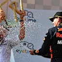 Race winner Max Verstappen (NED) Red Bull Racing celebrates on the podium with Jonathan Wheatley (GBR) Red Bull Racing Team Manager and the champagne at Formula One World Championship, Rd9, Austrian Grand Prix, Race, Spielberg, Austria, Sunday 1 July 2018