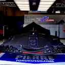Scuderia Toro Rosso STR13 under covers in the garage at Formula One World Championship, Rd9, Austrian Grand Prix, Race, Spielberg, Austria, Sunday 1 July 2018. © Jerry Andre/Sutton Images
