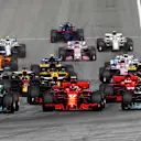 Lewis Hamilton (GBR) Mercedes-AMG F1 W09 EQ Power+, Kimi Raikkonen (FIN) Ferrari SF-71H and Valtteri Bottas (FIN) Mercedes-AMG F1 W09 EQ Power+ at the start of the race at Formula One World Championship, Rd9, Austrian Grand Prix, Race, Spielberg, Austria, Sunday 1 July 2018. © Glenn Dunbar/LAT/Sutton Images