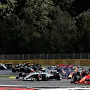 Lewis Hamilton (GBR) Mercedes-AMG F1 W09 EQ Power+ and Kimi Raikkonen (FIN) Ferrari SF-71H battle on lap one at Formula One World Championship, Rd9, Austrian Grand Prix, Race, Spielberg, Austria, Sunday 1 July 2018. © Manuel Goria/Sutton Images