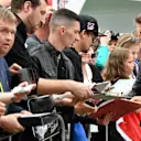 Romain Grosjean (FRA) Haas F1 signs autographs for the fans at Formula One World Championship, Rd9, Austrian Grand Prix, Preparations, Spielberg, Austria, Thursday 28 June 2018. © Jerry Andre/Sutton Images