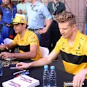 Carlos Sainz (ESP) Renault Sport F1 Team and Nico Hulkenberg (GER) Renault Sport F1 Team at the autograph session at Formula One World Championship, Rd4, Azerbaijan Grand Prix, Qualifying, Baku City Circuit, Baku, Azerbaijan, Saturday 28 April 2018. © Simon Galloway/Sutton Images