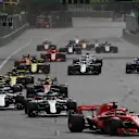Sebastian Vettel (GER) Ferrari SF-71H leads Lewis Hamilton (GBR) Mercedes-AMG F1 W09 EQ Power+ at Formula One World Championship, Rd4, Azerbaijan Grand Prix, Race, Baku City Circuit, Baku, Azerbaijan, Sunday 29 April 2018. © Mark Sutton/Sutton Images