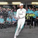 Race winner Lewis Hamilton (GBR) Mercedes-AMG F1 celebrates with the team and the champagne at Formula One World Championship, Rd4, Azerbaijan Grand Prix, Race, Baku City Circuit, Baku, Azerbaijan, Sunday 29 April 2018. © Simon Galloway/Sutton Images