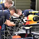 Red Bull Racing RB14 is worked on in the garage at Formula One World Championship, Rd2, Bahrain Grand Prix, Practice, Bahrain International Circuit, Sakhir, Bahrain, Friday 6 April 2018. © Mark Sutton/Sutton Images