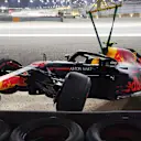 The crashed car of Max Verstappen (NED) Red Bull Racing RB14 is recovered in Q1 at Formula One World Championship, Rd2, Bahrain Grand Prix, Qualifying, Bahrain International Circuit, Sakhir, Bahrain, Saturday 7 April 2018. © Jerry Andre/Sutton Images