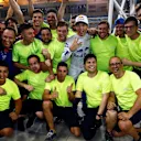 Pierre Gasly (FRA) Scuderia Toro Rosso celebrates fourth place with the team at Formula One World Championship, Rd2, Bahrain Grand Prix, Race, Bahrain International Circuit, Sakhir, Bahrain, Sunday 8 April 2018. © Andy Hone/LAT/Sutton Images