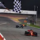 Race winner Sebastian Vettel Ferrari SF-71H crosses the line and takes the chequered flag at Formula One World Championship, Rd2, Bahrain Grand Prix, Race, Bahrain International Circuit, Sakhir, Bahrain, Sunday 8 April 2018. © Mark Sutton/Sutton Images