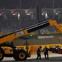 The car of race retiree Daniel Ricciardo (AUS) Red Bull Racing RB14 is recovered at Formula One World Championship, Rd2, Bahrain Grand Prix, Race, Bahrain International Circuit, Sakhir, Bahrain, Sunday 8 April 2018. © Zak Mauger/LAT/Sutton Images