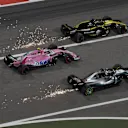 Lewis Hamilton (GBR) Mercedes-AMG F1 W09 EQ Power+, Esteban Ocon (FRA) Force India VJM11 and Nico Hulkenberg (GER) Renault Sport F1 Team RS18 bttle and sparks at Formula One World Championship, Rd2, Bahrain Grand Prix, Race, Bahrain International Circuit, Sakhir, Bahrain, Sunday 8 April 2018. © Mark Sutton/Sutton Images