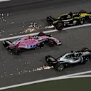 Lewis Hamilton (GBR) Mercedes-AMG F1 W09 EQ Power+, Esteban Ocon (FRA) Force India VJM11 and Nico Hulkenberg (GER) Renault Sport F1 Team RS18 battle at Formula One World Championship, Rd2, Bahrain Grand Prix, Race, Bahrain International Circuit, Sakhir, Bahrain, Sunday 8 April 2018. © Mark Sutton/Sutton Images