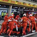The car of Kimi Raikkonen (FIN) Ferrari SF-71H is pushed back in pit lane at Formula One World Championship, Rd2, Bahrain Grand Prix, Race, Bahrain International Circuit, Sakhir, Bahrain, Sunday 8 April 2018. © Mark Sutton/Sutton Images