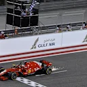 Race winner Sebastian Vettel (GER) Ferrari SF-71H crosses the line and takes the chequered flag at Formula One World Championship, Rd2, Bahrain Grand Prix, Race, Bahrain International Circuit, Sakhir, Bahrain, Sunday 8 April 2018. © Simon Galloway/Sutton Images