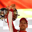 Race winner Sebastian Vettel (GER) Ferrari celebrates on the podium at Formula One World Championship, Rd2, Bahrain Grand Prix, Race, Bahrain International Circuit, Sakhir, Bahrain, Sunday 8 April 2018. © Jerry Andre/Sutton Images
