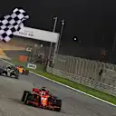 Race winner Sebastian Vettel (GER) Ferrari SF-71H crosses the line and takes the chequered flag at Formula One World Championship, Rd2, Bahrain Grand Prix, Race, Bahrain International Circuit, Sakhir, Bahrain, Sunday 8 April 2018. © Mark Sutton/Sutton Images