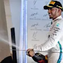 Lewis Hamilton (GBR) Mercedes-AMGlhp celebrates on the podium at Formula One World Championship, Rd2, Bahrain Grand Prix, Race, Bahrain International Circuit, Sakhir, Bahrain, Sunday 8 April 2018. © Jerry Andre/Sutton Images