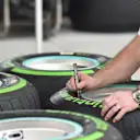 Mercedes AMG F1 mechanic marks Pirelli tyres at Formula One World Championship, Rd2, Bahrain Grand Prix, Preparations, Bahrain International Circuit, Sakhir, Bahrain, Thursday 5 April 2018. © Simon Galloway/Sutton Images