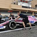 Force India F1 mechanics with Force India VJM11 in pit lane at Formula One World Championship, Rd2, Bahrain Grand Prix, Preparations, Bahrain International Circuit, Sakhir, Bahrain, Thursday 5 April 2018. © Simon Galloway/Sutton Images