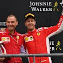 Sebastian Vettel, Ferrari and David Sanchez, Ferrari, celebrates on the podium with the trophies at Formula One World Championship, Rd13, Belgian Grand Prix, Race, Spa Francorchamps, Belgium, Sunday 26 August 2018. © Mark Sutton/Sutton Images