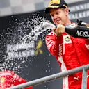 Sebastian Vettel, Ferrari celebrates with the champagne on the podium at Formula One World Championship, Rd13, Belgian Grand Prix, Race, Spa Francorchamps, Belgium, Sunday 26 August 2018. © Jerry Andre/Sutton Images