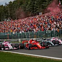Esteban Ocon, Racing Point Force India VJM11, Sebastian Vettel, Ferrari SF71H, Lewis Hamilton, Mercedes AMG F1 W09 and Sergio Perez, Racing Point Force India VJM11 battle on lap one at Formula One World Championship, Rd13, Belgian Grand Prix, Race, Spa Francorchamps, Belgium, Sunday 26 August 2018. © Manuel Goria/Sutton Images