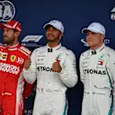 (L to R): Sebastian Vettel, Ferrari, Lewis Hamilton, Mercedes AMG F1 and Valtteri Bottas, Mercedes AMG F1 celebrate in Parc Ferme at Formula One World Championship, Rd20, Brazilian Grand Prix, Qualifying, Interlagos, Sao Paulo, Brazil, Saturday 10 November 2018.