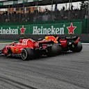 Sebastian Vettel, Ferrari SF71H and Daniel Ricciardo, Red Bull Racing RB14 battle at Formula One World Championship, Rd20, Brazilian Grand Prix, Race, Interlagos, Sao Paulo, Brazil, Sunday 11 November 2018.