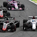 Marcus Ericsson, Alfa Romeo Sauber C37 and Romain Grosjean, Haas F1 Team VF-18 collide at the start of the race at Formula One World Championship, Rd20, Brazilian Grand Prix, Race, Interlagos, Sao Paulo, Brazil, Sunday 11 November 2018.