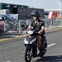 Kevin Magnussen (DEN) Haas F1 on a scooter at Formula One World Championship, Rd10, British Grand Prix, Practice, Silverstone, England, Friday 6 July 2018. © Simon Galloway/Sutton Images