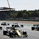 Nico Hulkenberg (GER) Renault Sport F1 Team RS18 and Carlos Sainz jr (ESP) Renault Sport F1 Team RS18 on the grid for practice start at Formula One World Championship, Rd10, British Grand Prix, Practice, Silverstone, England, Friday 6 July 2018. © Mark Sutton/Sutton Images