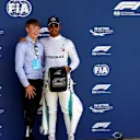 Lewis Hamilton (GBR) Mercedes-AMG F1 receives the Pirelli Pole Position Award from Billy Monger (GBR) at Formula One World Championship, Rd10, British Grand Prix, Qualifying, Silverstone, England, Saturday 7 July 2018. © Manuel Goria/Sutton Images