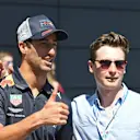 Daniel Ricciardo (AUS) Red Bull Racing with fan at Formula One World Championship, Rd10, British Grand Prix, Race, Silverstone, England, Sunday 8 July 2018. © Simon Galloway/Sutton Images