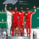 (L to R): Lewis Hamilton (GBR) Mercedes-AMG F1,Claudio Albertini (ITA) Ferrari Engineer, Sebastian Vettel (GER) Ferrari and Kimi Raikkonen (FIN) Ferrari celebrate on the podium at Formula One World Championship, Rd10, British Grand Prix, Race, Silverstone, England, Sunday 8 July 2018. © Manuel Goria/Sutton Images