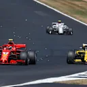 Kimi Raikkonen (FIN) Ferrari SF-71H overtakes Carlos Sainz jr (ESP) Renault Sport F1 Team RS18 at Formula One World Championship, Rd10, British Grand Prix, Race, Silverstone, England, Sunday 8 July 2018. © Manuel Goria/Sutton Images