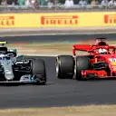 Valtteri Bottas (FIN) Mercedes-AMG F1 W09 EQ Power+ and Sebastian Vettel (GER) Ferrari SF-71H battle at Formula One World Championship, Rd10, British Grand Prix, Race, Silverstone, England, Sunday 8 July 2018. © Zak Mauger/LAT/Sutton Images