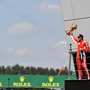 Race winner Sebastian Vettel (GER) Ferrari celebrates on the podium with the trophy at Formula One World Championship, Rd10, British Grand Prix, Race, Silverstone, England, Sunday 8 July 2018. © Mark Sutton/Sutton Images