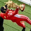 Race winner Sebastian Vettel (GER) Ferrari celebrates on the podium with the trophy at Formula One World Championship, Rd10, British Grand Prix, Race, Silverstone, England, Sunday 8 July 2018. © Jerry Andre/Sutton Images