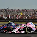 Pierre Gasly (FRA) Scuderia Toro Rosso STR13 and Sergio Perez (MEX) Force India VJM11 battle at Formula One World Championship, Rd10, British Grand Prix, Race, Silverstone, England, Sunday 8 July 2018. © Mark Sutton/Sutton Images