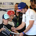 Fernando Alonso (ESP) McLaren and grid kid at Formula One World Championship, Rd10, British Grand Prix, Race, Silverstone, England, Sunday 8 July 2018. © Jerry Andre/Sutton Images