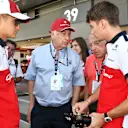 Marcus Ericsson (SWE) Alfa Romeo Sauber F1 Team and Charles Leclerc (MON) Alfa Romeo Sauber F1 Team with Oscar Fangio (ARG) and Ruben Fangio (ARG) at Formula One World Championship, Rd10, British Grand Prix, Race, Silverstone, England, Sunday 8 July 2018. © Mark Sutton/Sutton Images