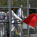Marshals wave the red flag in FP1 at Formula One World Championship, Rd7, Canadian Grand Prix, Practice, Montreal, Canada, Friday 8 June 2018. © Mark Sutton/Sutton Images