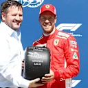 Sebastian Vettel (GER) Ferrari receives the Pirelli Pole Position award from Paul Hembery (GBR) Pirelli Motorsport Director at Formula One World Championship, Rd7, Canadian Grand Prix, Qualifying, Montreal, Canada, Saturday 9 June 2018. © Glenn Dunbar/Sutton Images