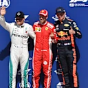 (L to R): Valtteri Bottas (FIN) Mercedes-AMG F1, Sebastian Vettel (GER) Ferrari and Max Verstappen (NED) Red Bull Racing celebrate in parc ferme at Formula One World Championship, Rd7, Canadian Grand Prix, Qualifying, Montreal, Canada, Saturday 9 June 2018. © Jerry Andre/Sutton Images