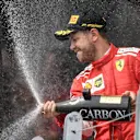 Sebastian Vettel (GER) Ferrari celebrates on the podium with the champagne at Formula One World Championship, Rd7, Canadian Grand Prix, Race, Montreal, Canada, Sunday10 June 2018. © Simon Galloway/Sutton Images
